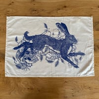 Image 1 of rowan the hare tea towel