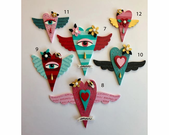 Your choice of 18 Winged Hearts with Eyes, Bees and Flowers Clay Wall Hangings