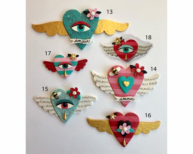 Your choice of 18 Winged Hearts with Eyes, Bees and Flowers Clay Wall Hangings