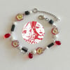 red flower and black lining nana wire bracelet