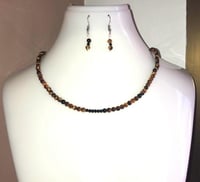Image 1 of Conjunto OjoDeTigre