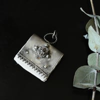 A book of stars and sweet whispers silver and paper pendant