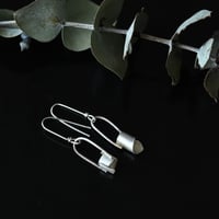 Raw spiral silver earrings