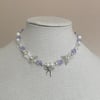 bow and alexandrite glass coquette necklace