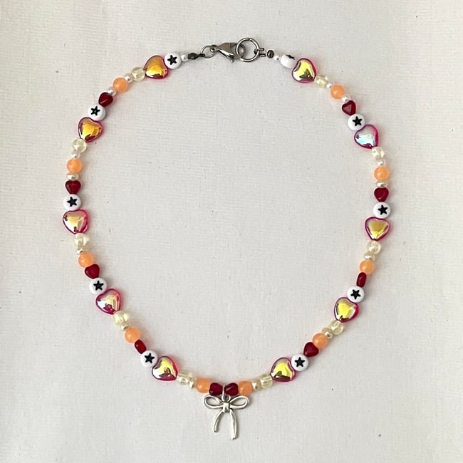 kiki's bow heart necklace