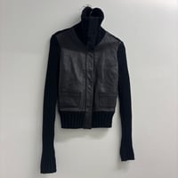 Image 1 of knit + leather jacket
