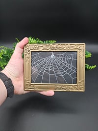 Image 1 of Vintage floral detail brass framed preserved web