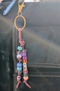 Image 3 of Colorful beaded keychain with the word KIND 