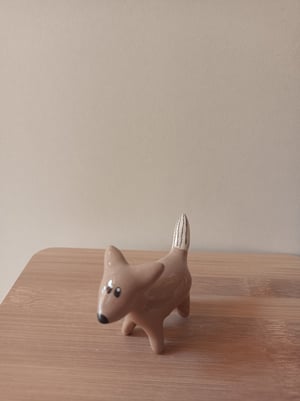 Image of Petit renard brun gris