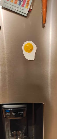 Image 1 of egg magnet 