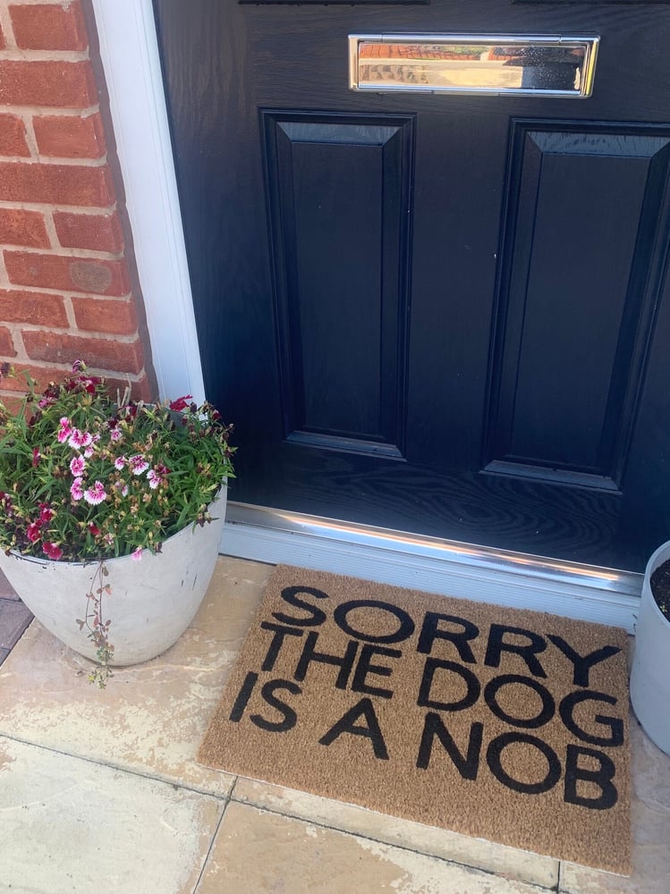 Image of Dog is a nob personalised door mat. No silhouette. Hand painted. Makes the perfect gift