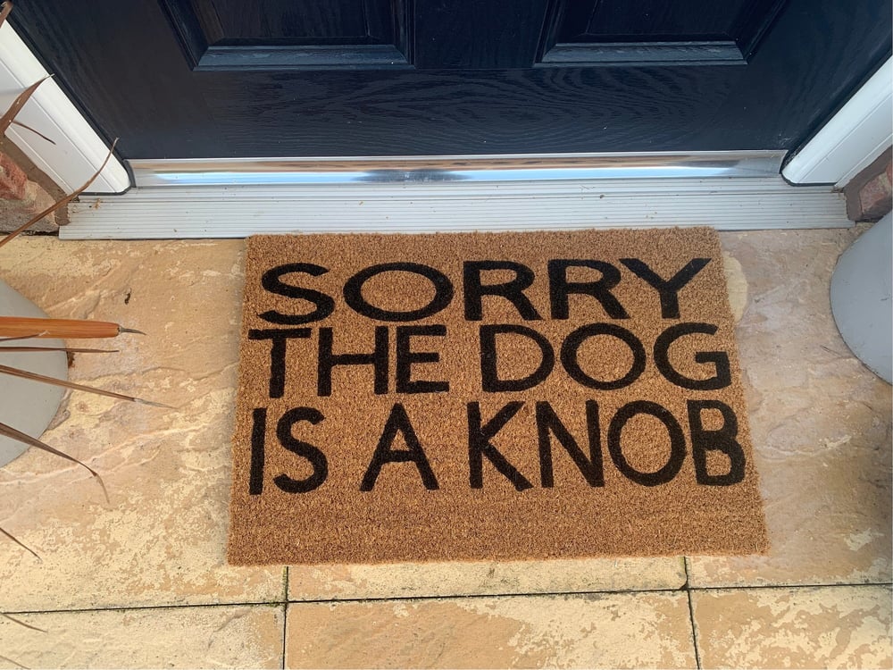 Image of Dog is a Knob personalised door mat. No silhouette just the writing. Hand painted. Makes the perf...