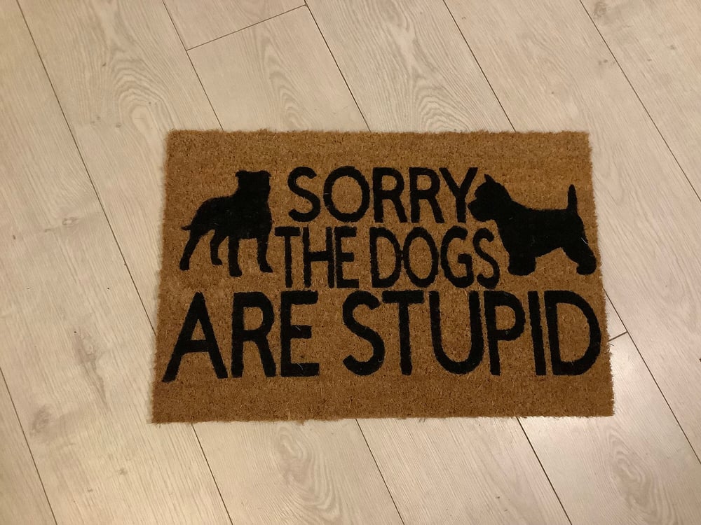 Image of Sorry the dogs are stupid.  Personalised dog breed coir door mat. Naughty dog / New home / House ...