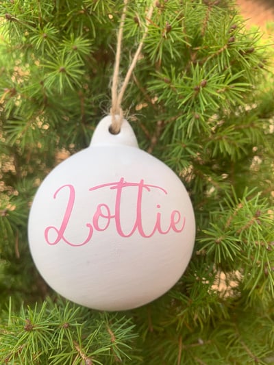 Image of Personalised name ceramic Christmas bauble decoration. Christmas tree decor. Perfect to keep or gift
