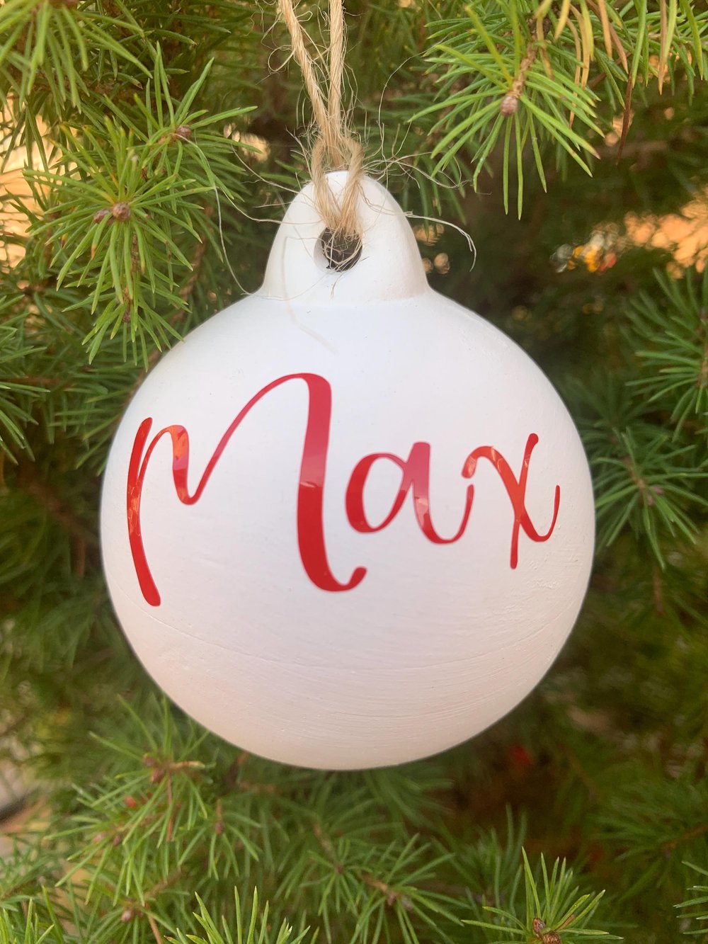 Image of Personalised name ceramic Christmas bauble decoration. Christmas tree decor. Perfect to keep or gift