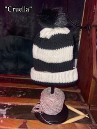 Image 1 of Knitted Beanie With Puff Ball