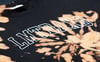BLACK BLEACH DYE COLLEGE TRAD LOGO