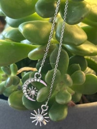 DAZZLING SUN AND MOON EARRINGS 