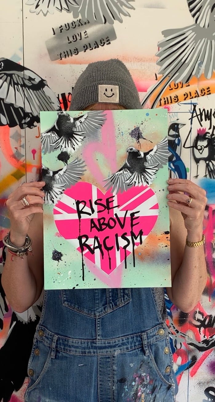 ‘RISE ABOVE RACISM’