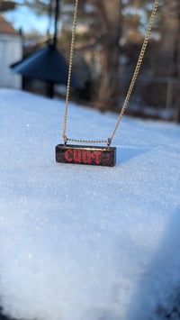Image 2 of Red on black on gold necklace