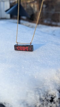 Image 3 of Red on black on gold necklace