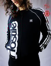 Image 1 of vintage ADIDAS zip black jacket