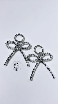 Image 1 of CHARM SILVER KNOCK  (NEW SENSATION )