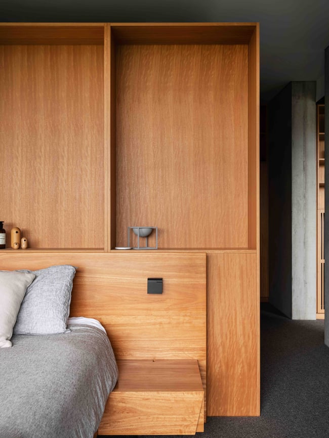 FLOATING BED WITH CLIPPED WING DRAWERS IN BLACKBUTT