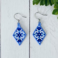 Image 1 of Blue and White Diamond