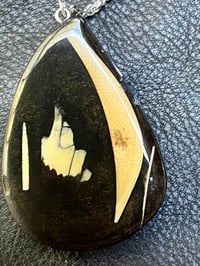 063 Black Velvet. Fine jewelry made from ancient mammoth ivory. Pendent by Jock Hildebrand.