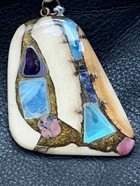 047 Old Style. Fine jewelry made from ancient mammoth ivory. Pendent by Jock Hildebrand.