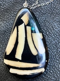 046 Two Directions, Fine jewelry made from ancient mammoth ivory. Pendent by Jock Hildebrand.