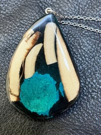 045 SOLD Blue Universe. Fine jewelry made from ancient mammoth ivory. Pendent by Jock Hildebrand.