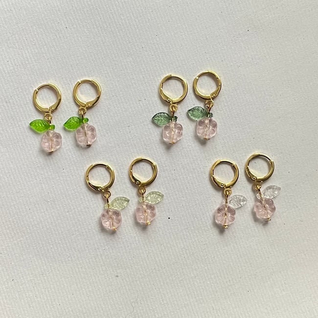chihiro's pink flower huggie hoop earrings