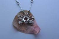 Image 1 of winged creature necklace