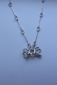 Image 2 of winged creature necklace