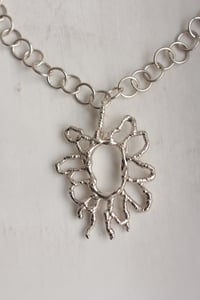 Image 1 of flower portal necklace