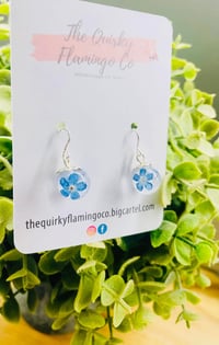 Silver forget me not globe earrings