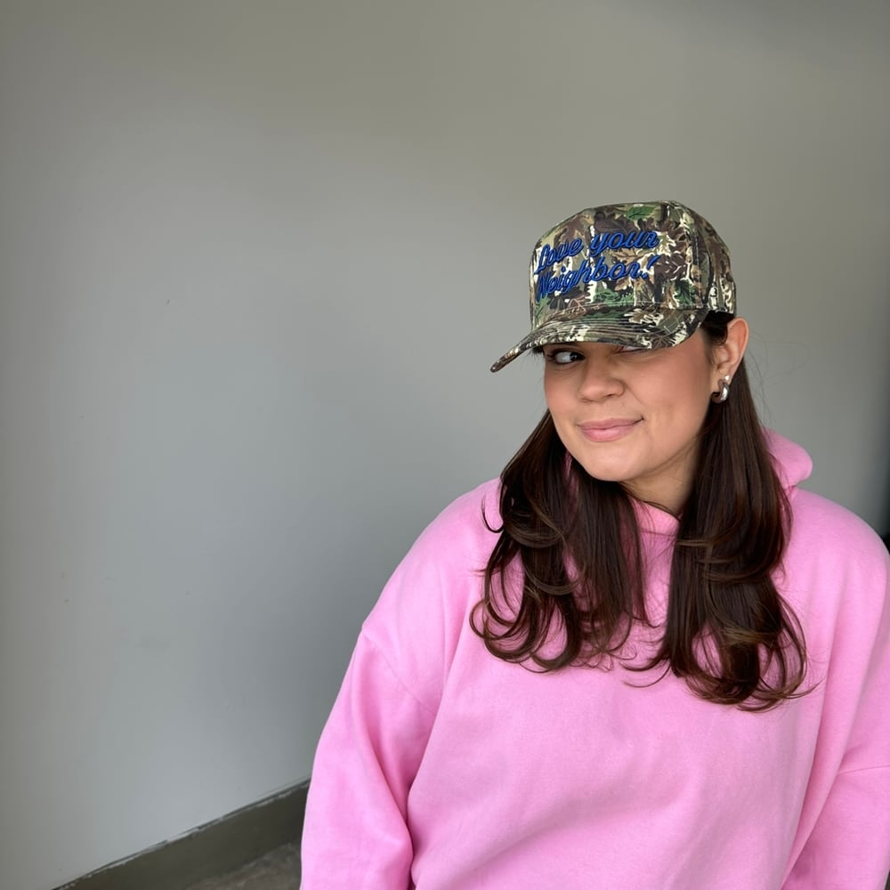 Image of camo / blue hat