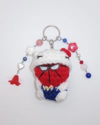 Image 2 of hello kitty x spider-man keychains