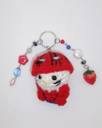 Image 3 of hello kitty x spider-man keychains