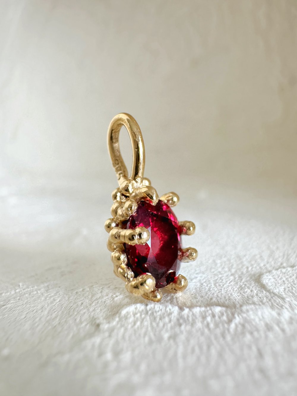 Image of Rhodolite Garnet Claw Pendant