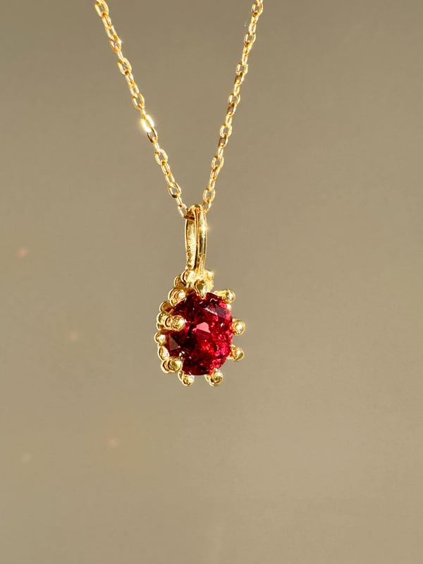 Image of Rhodolite Garnet Claw Pendant