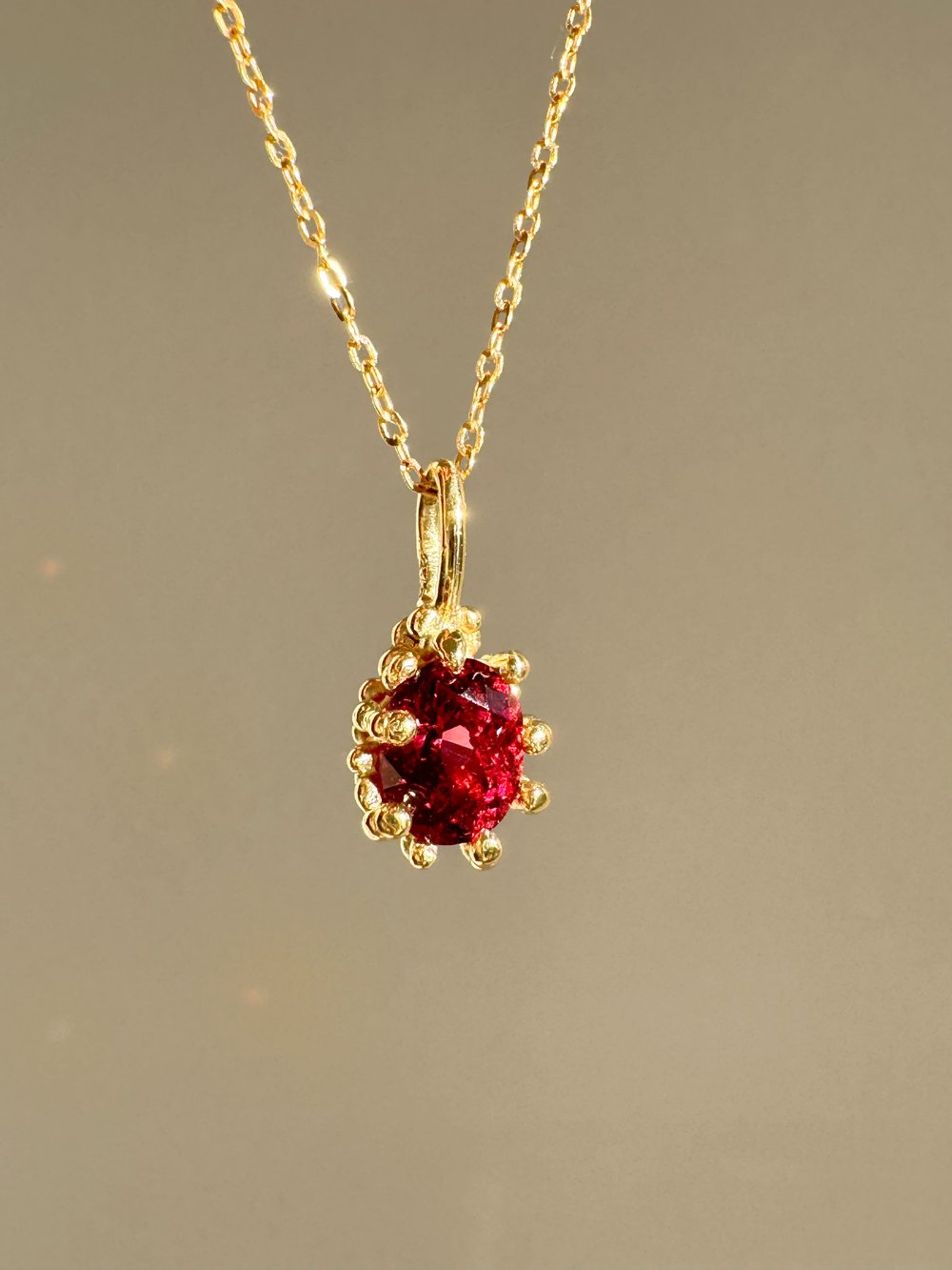 Image of Rhodolite Garnet Claw Pendant