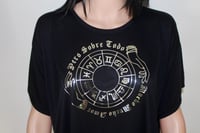 Image 1 of Walter Mercado Horoscope "Pero Sobre Todo Mucho Mucho Amor" Black Boxy Women Top with Silver Design