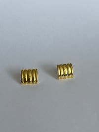 Image 1 of Row stud 