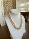 pair of faux pearl necklaces