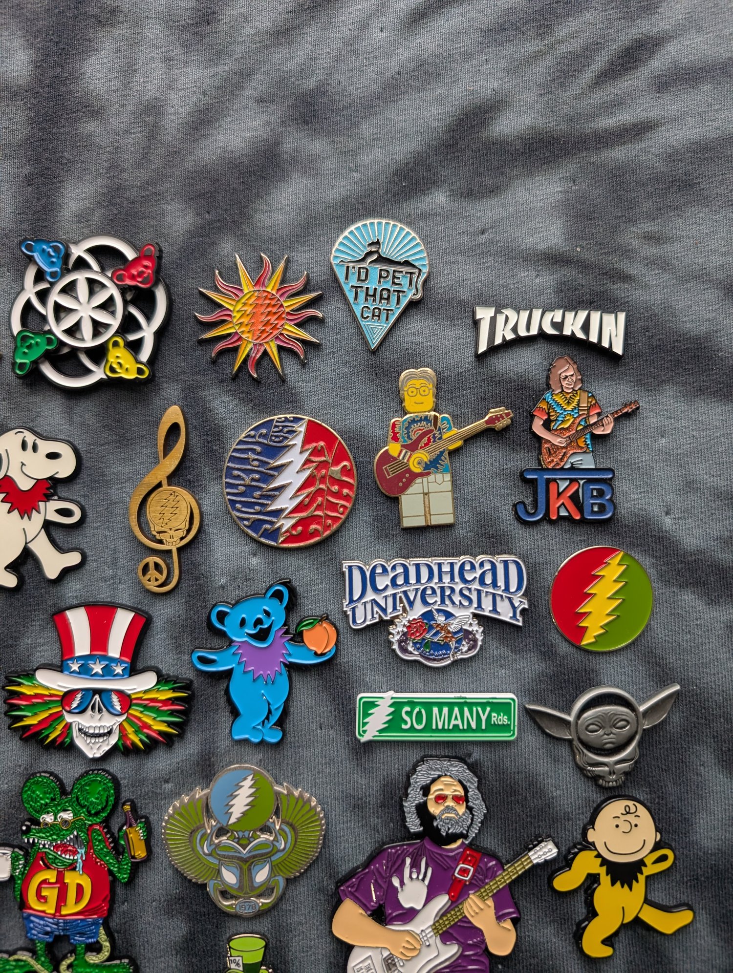 Image of Chooese a Grateful Dead Pin. Comes with 10 GD stickers.