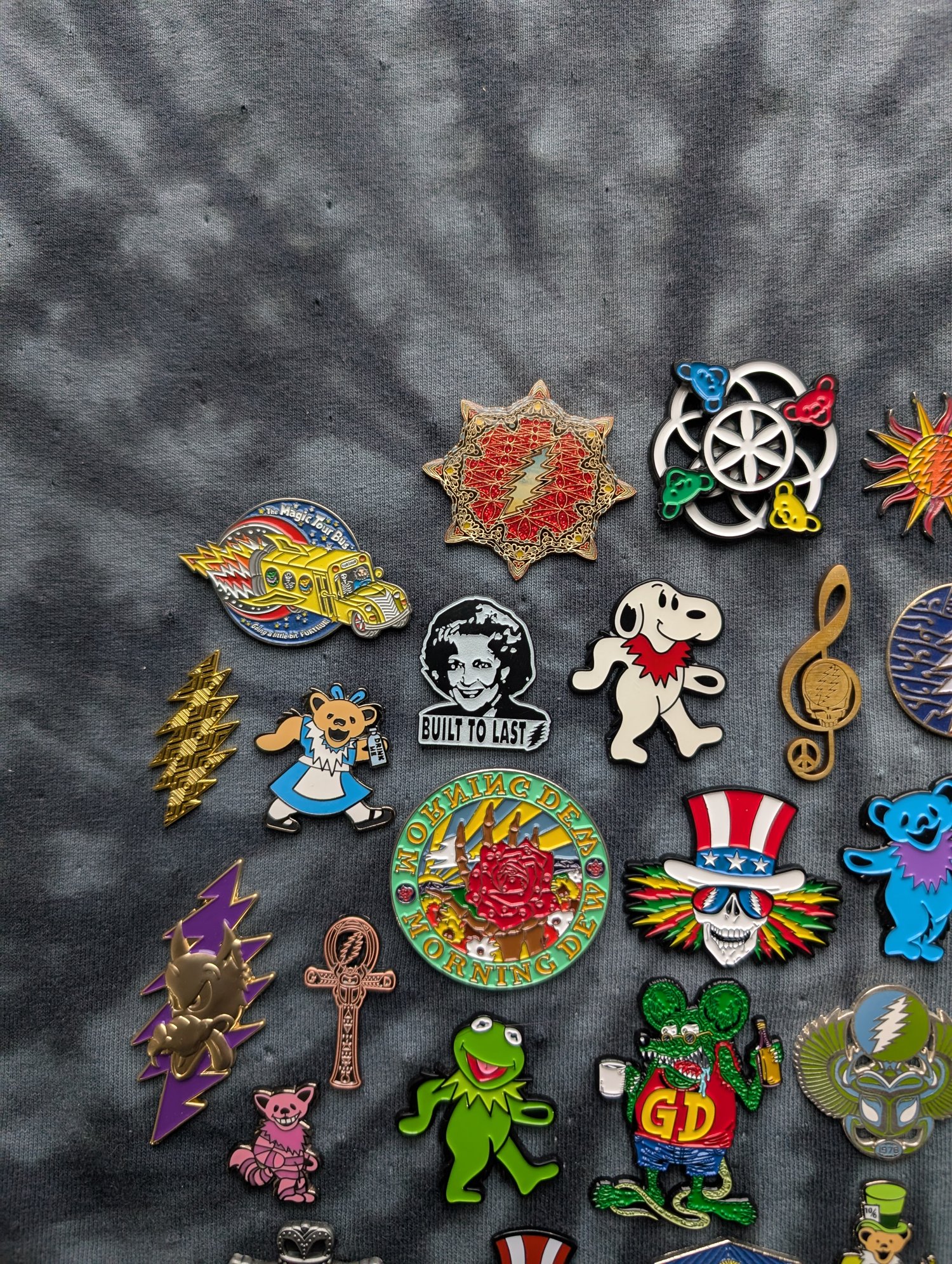 Image of Chooese a Grateful Dead Pin. Comes with 10 GD stickers.