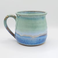 Image 1 of Chunky rippled mug. Green on Blue